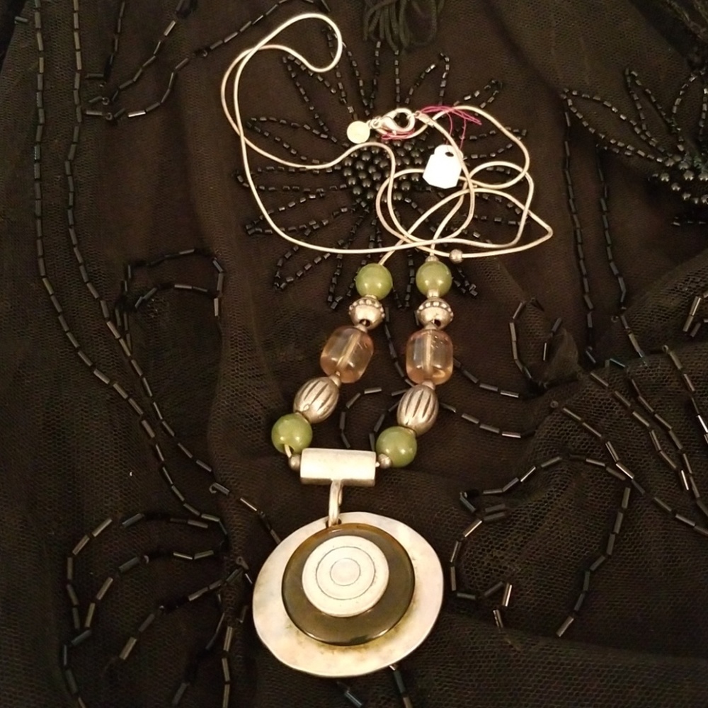 Silver and jade necklace.